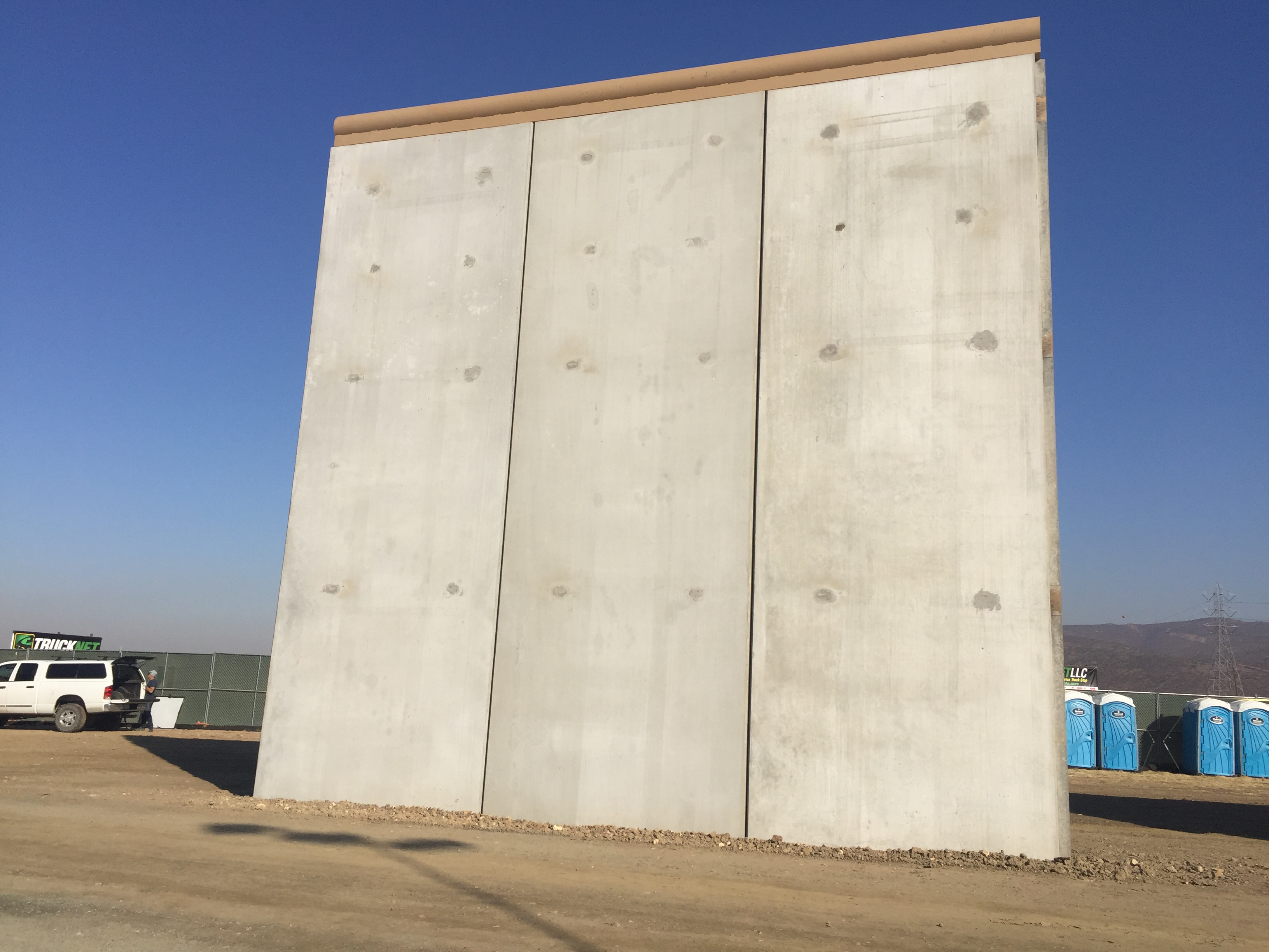 A border wall prototype stands by the U.S.-Mexico border, Oct. 26, 2017. <em>(Elma Gonzalez/KPBS)</em>
